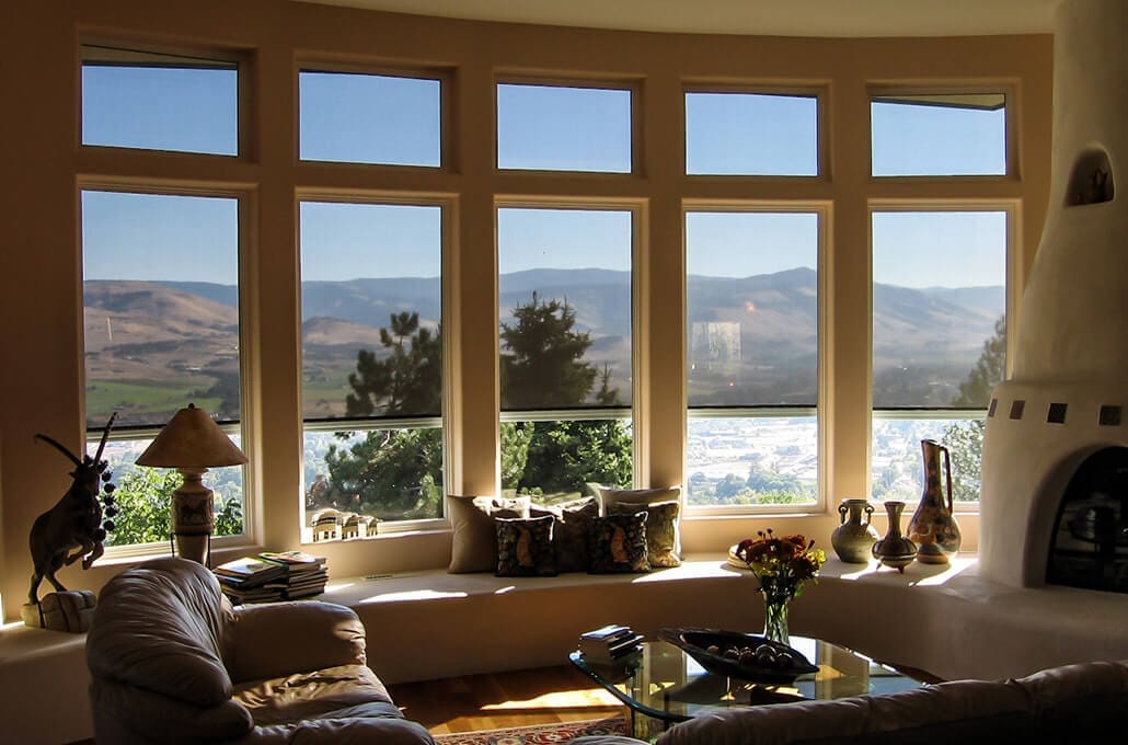 Retractable solar screens can cover any number of windows to keep your living area cool.